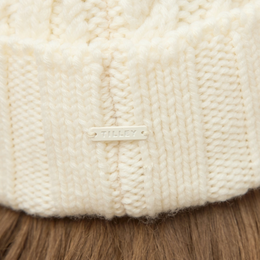 Image 104007_ALTMORE10.jpg, Product 104-007 / Price $55.00, Tilley Pom Pom Cable Beanie from Tilley on TSC.ca's Fashion department