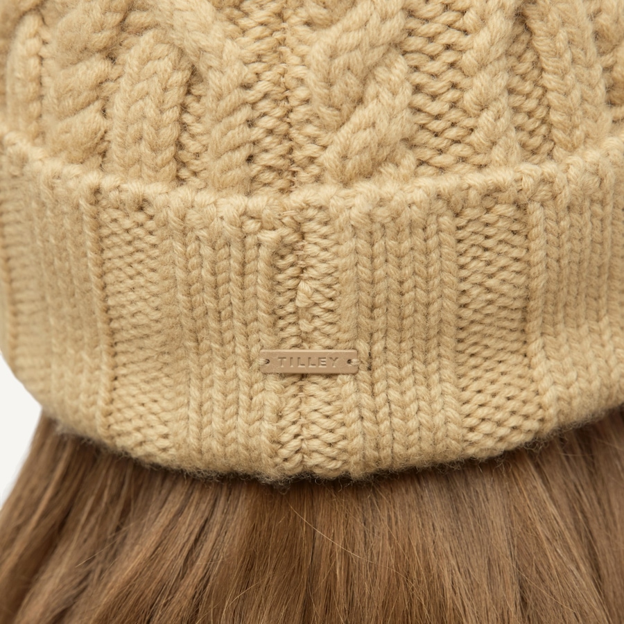 Image 104007_ALTMORE11.jpg, Product 104-007 / Price $55.00, Tilley Pom Pom Cable Beanie from Tilley on TSC.ca's Fashion department