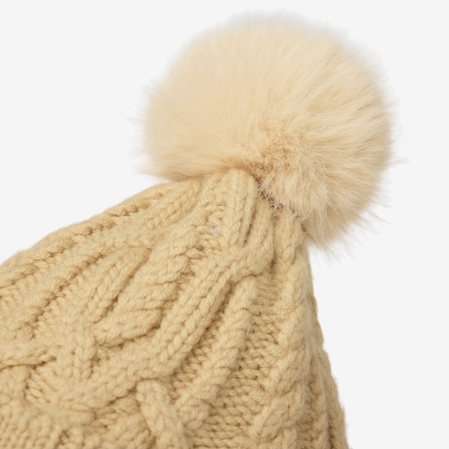 Image 104007_ALTMORE12.jpg, Product 104-007 / Price $55.00, Tilley Pom Pom Cable Beanie from Tilley on TSC.ca's Fashion department