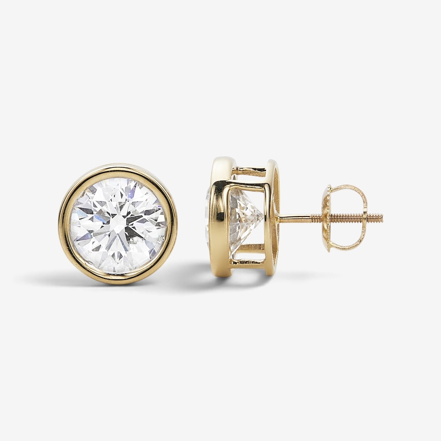 Image 115346_YGRND.jpg, Product 115-346 / Price $1,299.99 - $7,499.99, EVERA Diamonds 14K Gold Bezel-Set Shaped Diamond Stud Earrings from Evera Diamonds on TSC.ca's Jewellery department