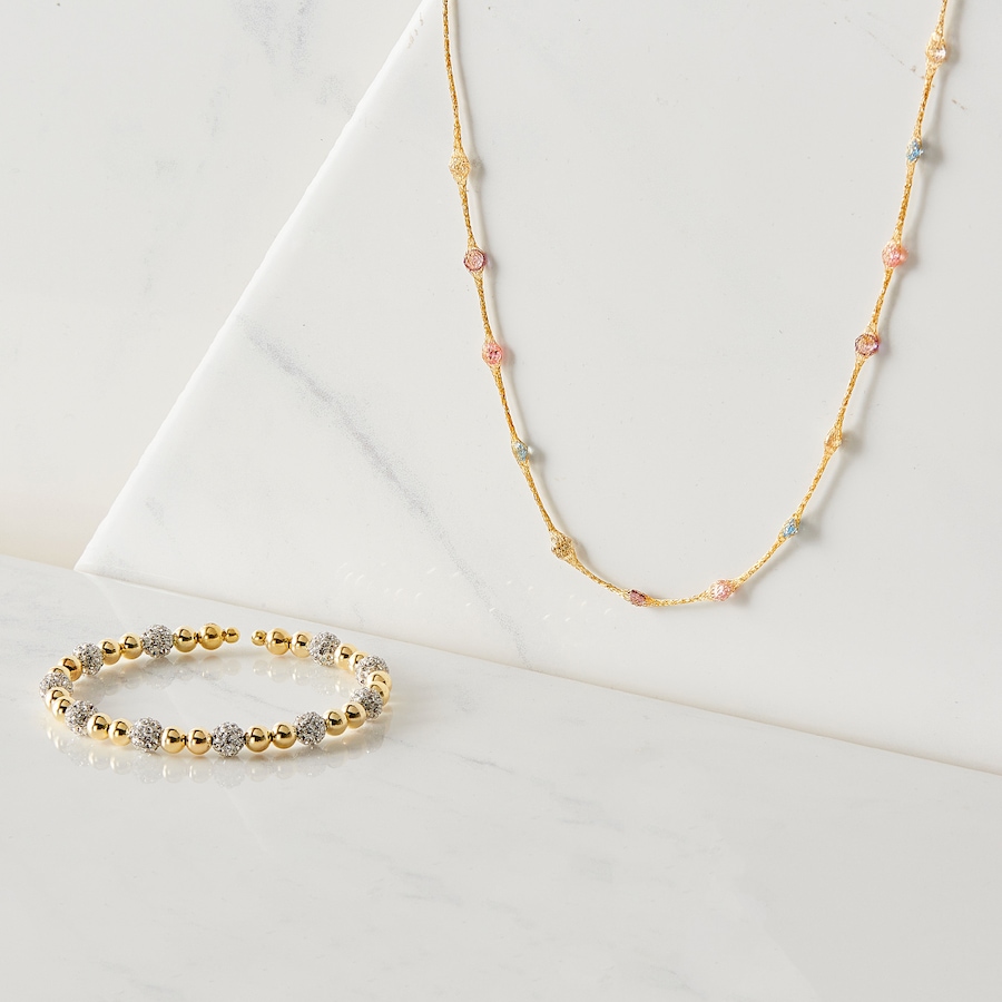 Image 115777_ALTMORE100.jpg, Product 115-777 / Price $669.99, Trugold 10K Yellow Gold Beads and Resin Crystal Bangle With Titanium Inside from TruGold on TSC.ca's Jewellery department