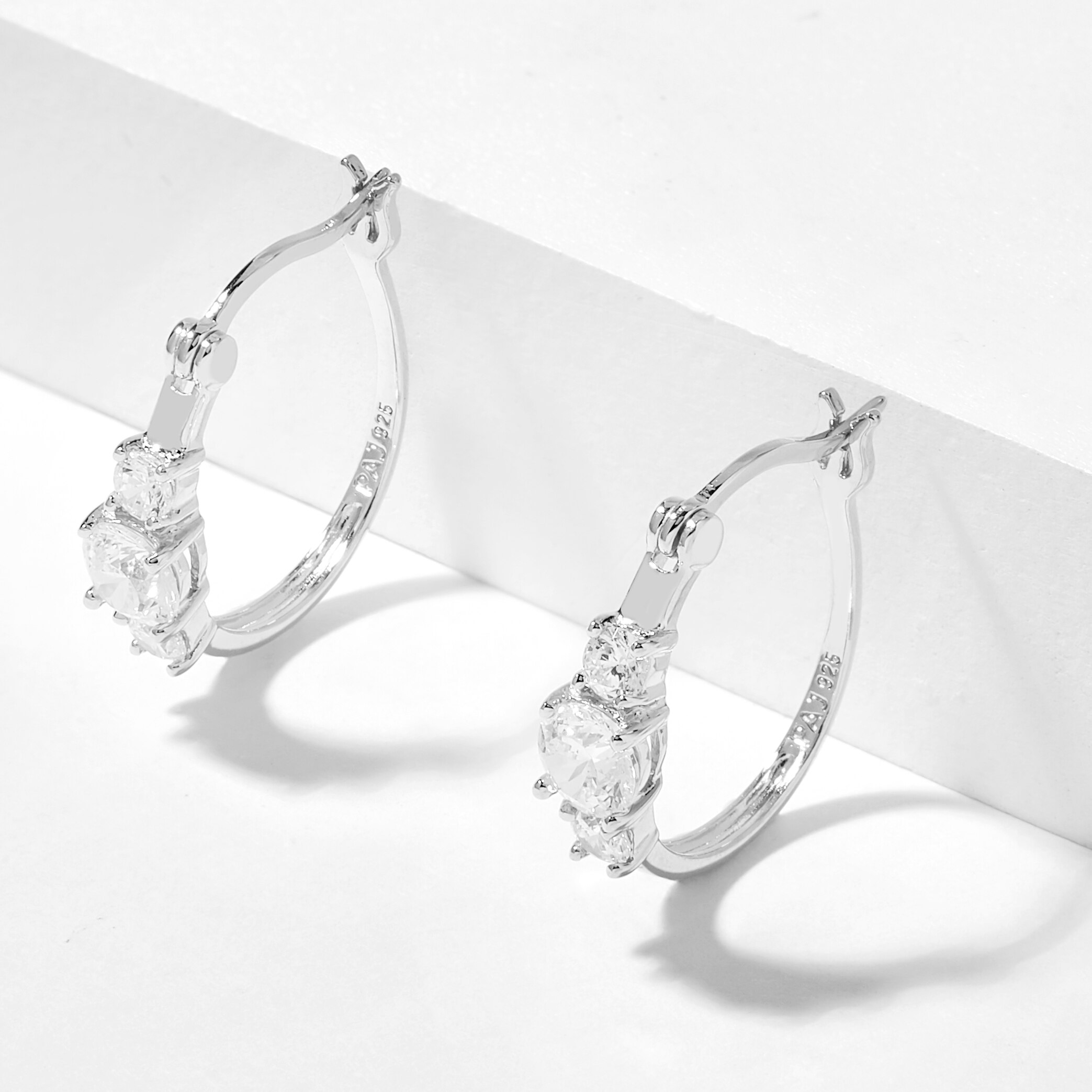 Claire's Silver Cubic Zirconia Three Stone 10MM Huggie Hoop Earrings |  Hamilton Place