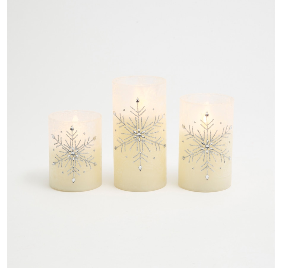 Image 212940.jpg, Product 212-940 / Price $29.99, Holiday Memories Lighted Glass Holiday Luminaries with LED Candle (set of 3) from Holiday Memories on TSC.ca's Home & Garden department