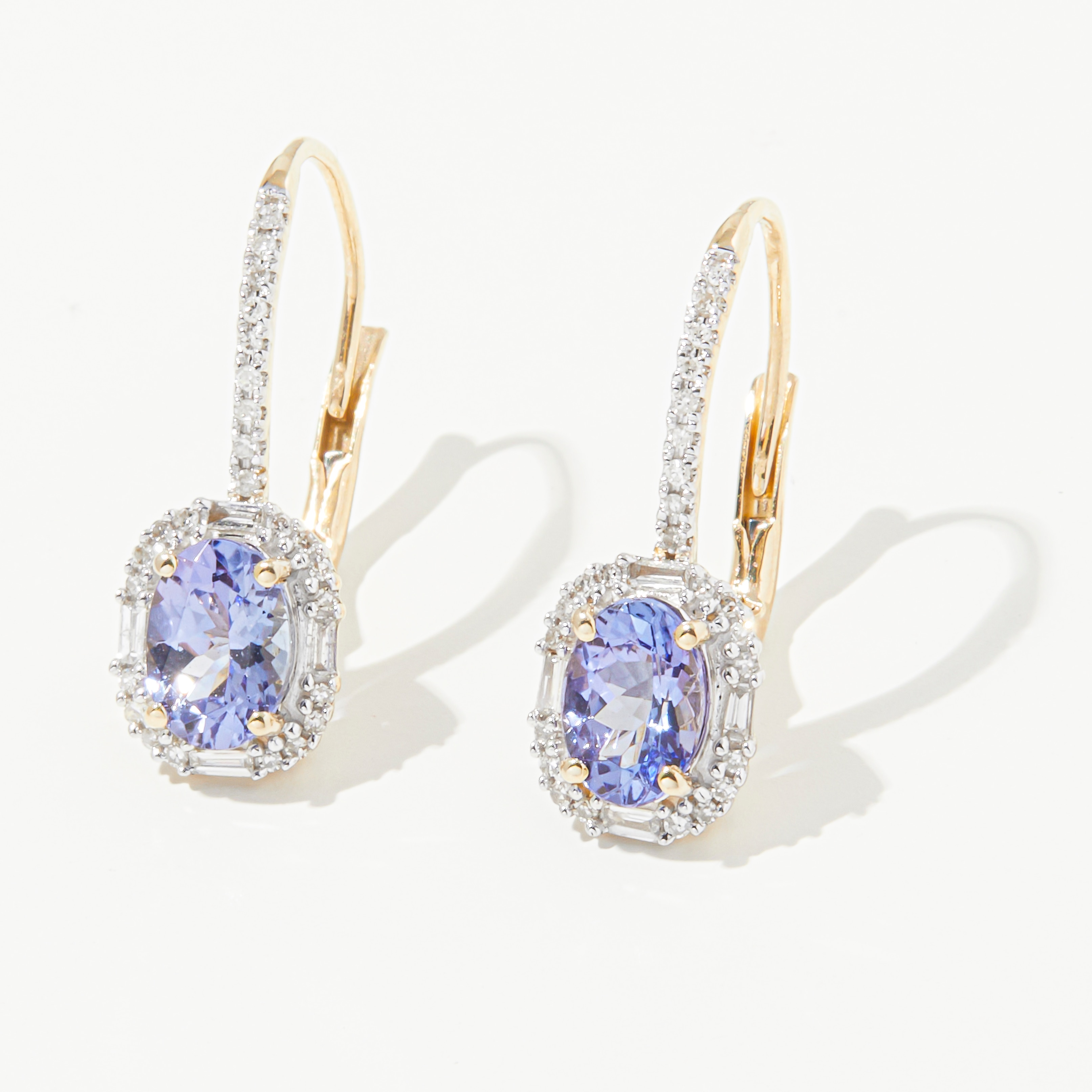 Gem Creations 14K Gold 7 mm x 5 mm Oval Tanzanite and 0.23 ctw White  Diamond Earrings