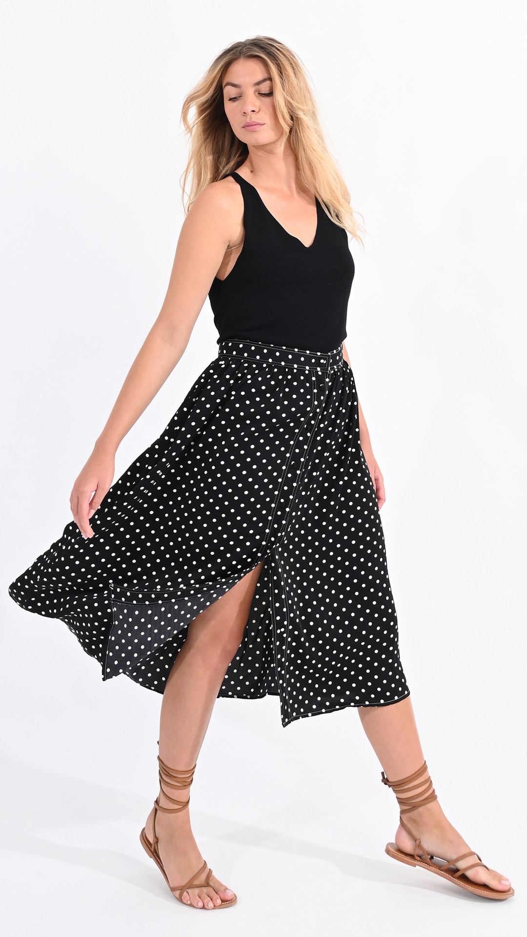 Black polka dot midi skirt hotsell