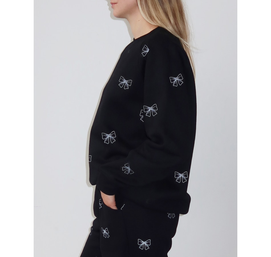 Image 409488_ALTMORE1.jpg, Product 409-488 / Price $89.88, Brunette The Label All Over Bow Big Sister Crew Sweater from Brunette The Label on TSC.ca's Fashion department