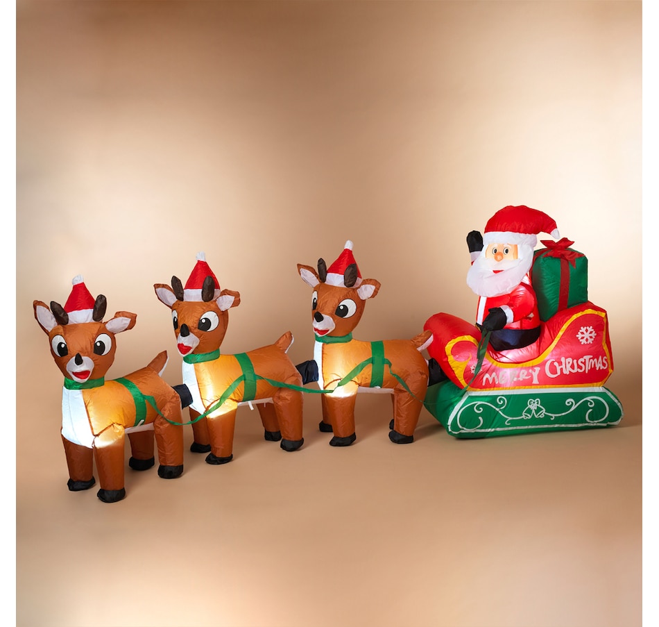 Image 441040_ALTMORE1.jpg, Product 441-040 / Price $49.33, Holiday Memories Lighted 96" Inflatable Santa Riding Sleigh With Reindeer from Holiday Memories on TSC.ca's Home & Garden department