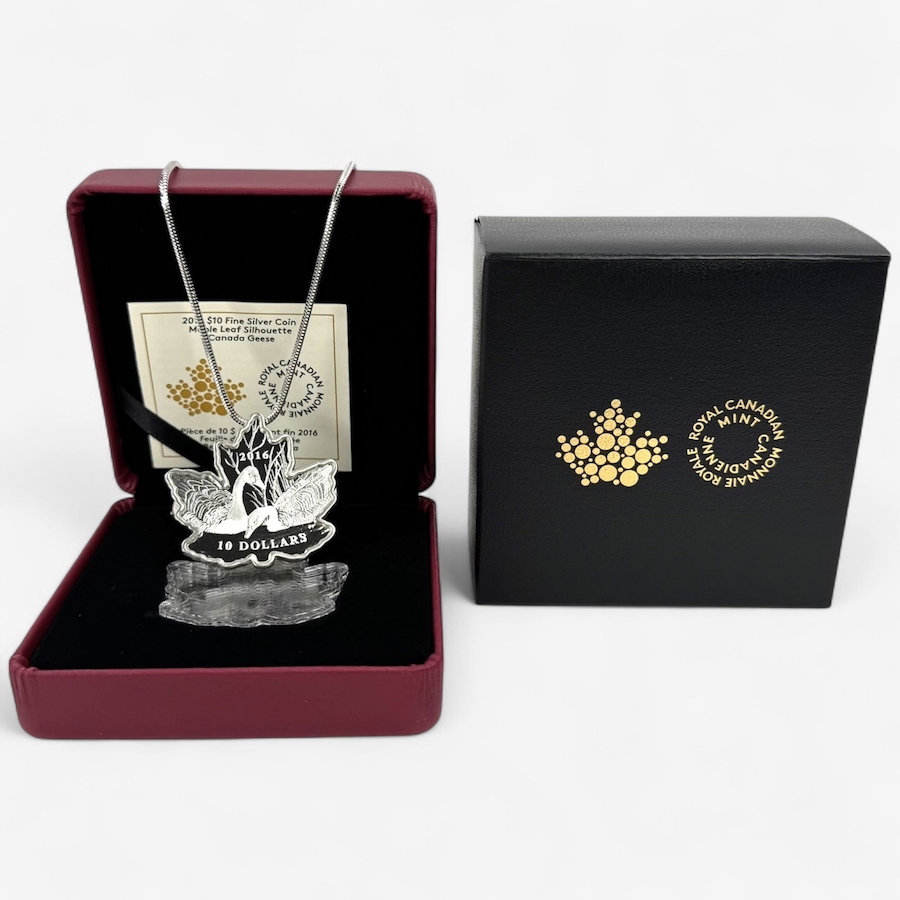 Image 701514.jpg, Product 701-514 / Price $189.95, $10 Fine Silver Maple Leaf Silhouette Coin Necklace with 20-Inch Sterling Silver Chain from Royal Canadian Mint (RCM) on TSC.ca's Coins department