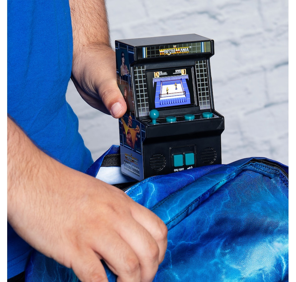 Image 711625_ALTMORE4.jpg, Product 711-625 / Price $29.99, Basic Fun Mini Classic WWE Handheld Arcade from Basic Fun on TSC.ca's Electronics department