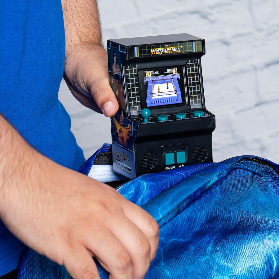 Image 711625_ALTMORE4.jpg, Product 711-625 / Price $29.99, Basic Fun Mini Classic WWE Handheld Arcade from Basic Fun on TSC.ca's Electronics department