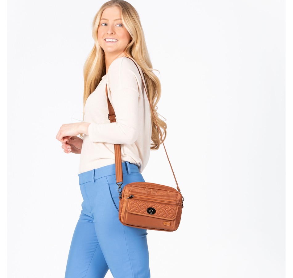 Image 712245_ALTMORE26.jpg, Product 712-245 / Price $110.00, Lug Switch With Peekaboo Pouch- Crossbody & Wallet from Lug on TSC.ca's Clothing & Shoes department