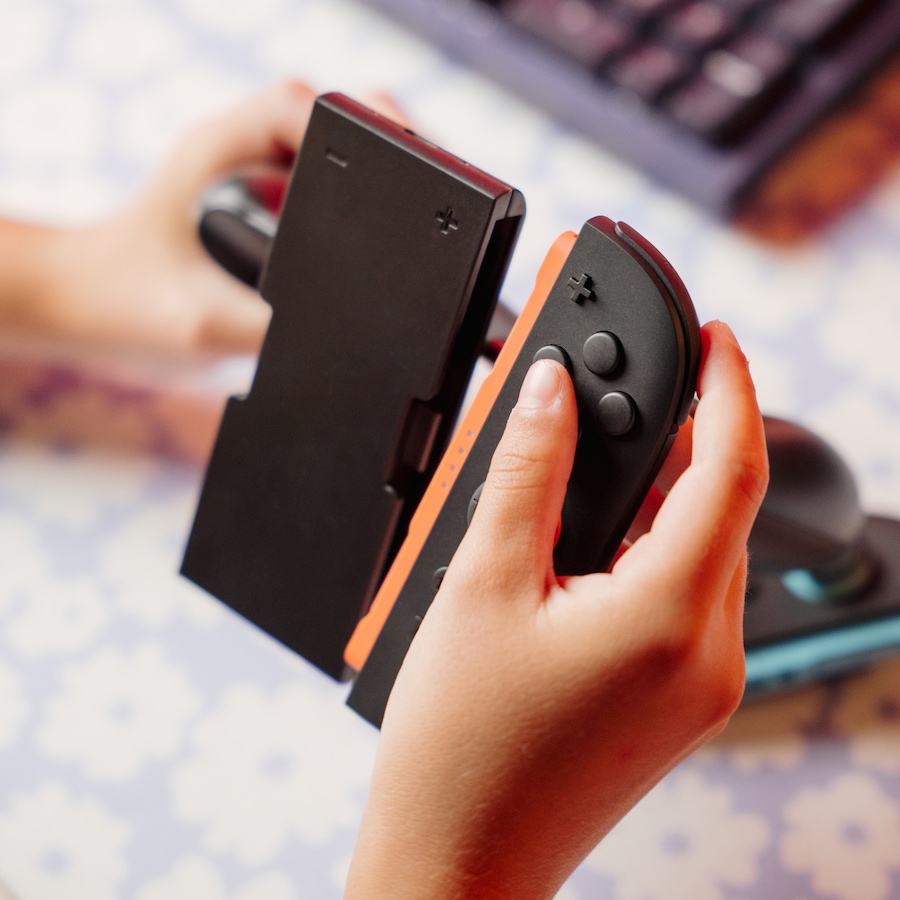 Image 718140_ALTMORE2.jpg, Product 718-140 / Price $39.99, Surge NS2A Joy-Con Power Grip with Built-In Battery from Surge on TSC.ca's Electronics department