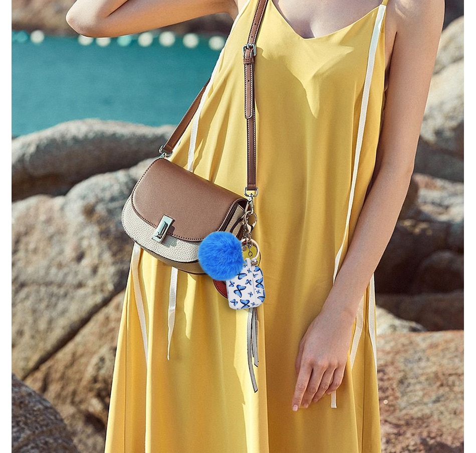 Image 724092_ALTMORE4.jpg, Product 724-092 / Price $25.99, Worryfree Gadgets Silicone Case for Apple AirPods 3 (3rd generation) with Pom-Pom Keychain from WFG on TSC.ca's Electronics department