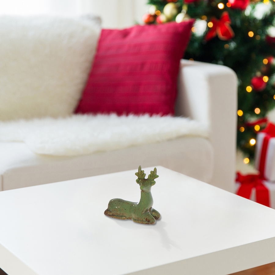 Image 737001_ALTMORE1.jpg, Product 737-001 / Price $29.99, IH Casa Décor Porcelain Sitting Reindeer Décor (green) from IH Casa Decor on TSC.ca's Home & Garden department