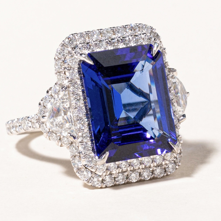 Image 746032_ALTMORE1.jpg, Product 746-032 / Price $29,995.00, Estate Originals Custom-Made 11.04-Carat Emerald Cut Tanzanite and Diamond Halo Ring with Half-Moon-Cut Diamond Shoulders from Estate Originals on TSC.ca's Jewellery department