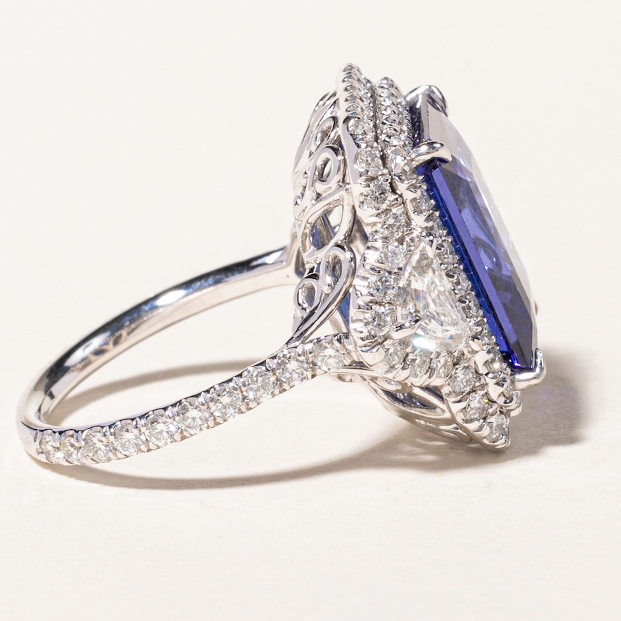 Image 746032_ALTMORE2.jpg, Product 746-032 / Price $29,995.00, Estate Originals Custom-Made 11.04-Carat Emerald Cut Tanzanite and Diamond Halo Ring with Half-Moon-Cut Diamond Shoulders from Estate Originals on TSC.ca's Jewellery department