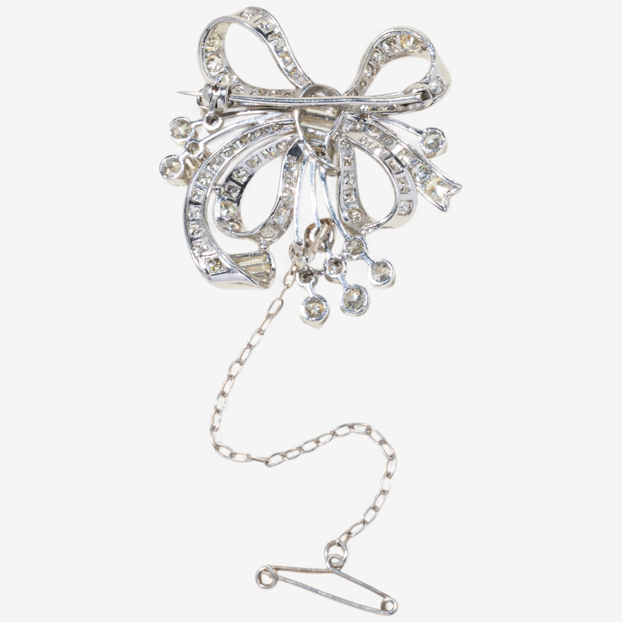 Image 746344_ALTMORE1.jpg, Product 746-344 / Price $7,495.00, Estate Originals 18K White Gold Round and Baguette-Cut Diamond Bow Motif Brooch from Estate Originals on TSC.ca's Jewellery department