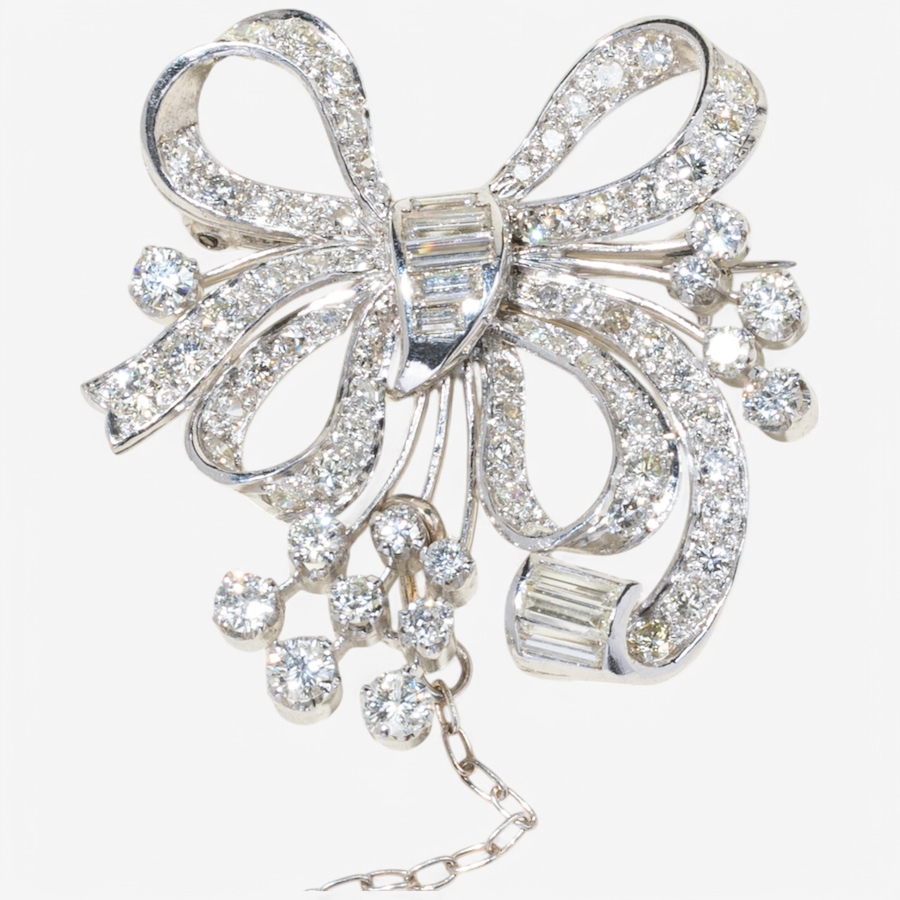 Image 746344_ALTMORE2.jpg, Product 746-344 / Price $7,495.00, Estate Originals 18K White Gold Round and Baguette-Cut Diamond Bow Motif Brooch from Estate Originals on TSC.ca's Jewellery department