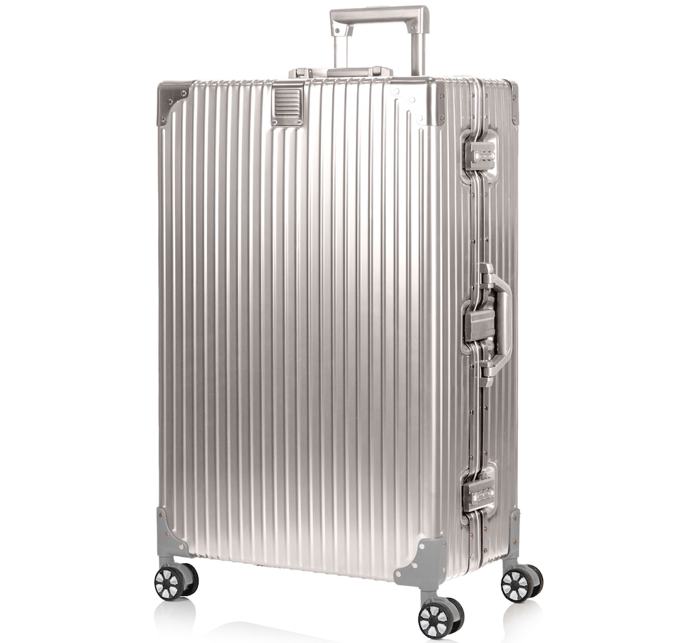 Image 754997_SIL.jpg, Product 754-997 / Price $349.99, Champs Luggage Elite Collection Hard Side Spinner Large Check-in Luggage from Champs on TSC.ca's Home & Garden department
