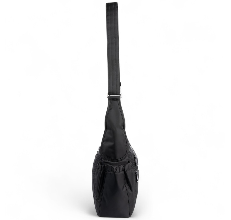 Image 755132_ALTMORE10.jpg, Product 755-132 / Price $59.99, Lug Collection Camper Crossbody Bag from Lug on TSC.ca's Home & Garden department