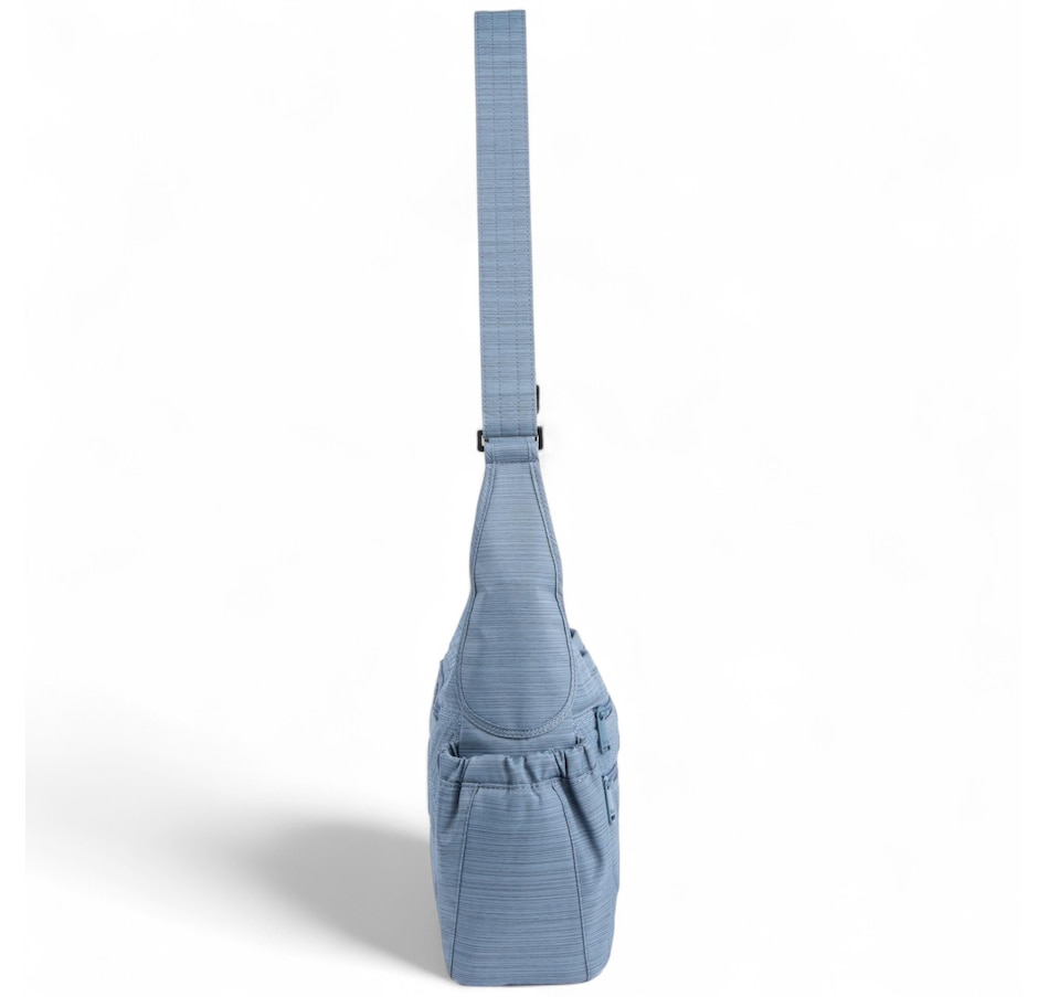 Image 755132_ALTMORE14.jpg, Product 755-132 / Price $59.99, Lug Collection Camper Crossbody Bag from Lug on TSC.ca's Home & Garden department