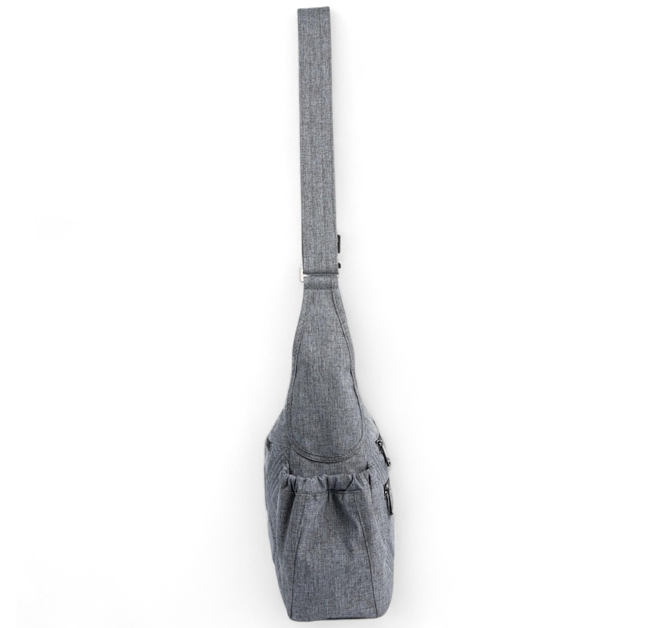 Image 755132_ALTMORE22.jpg, Product 755-132 / Price $59.99, Lug Collection Camper Crossbody Bag from Lug on TSC.ca's Home & Garden department