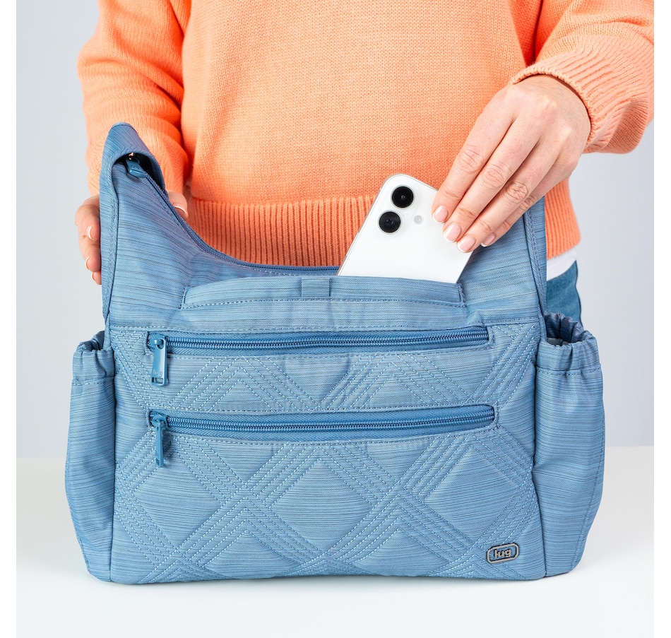 Image 755132_ALTMORE29.jpg, Product 755-132 / Price $59.99, Lug Collection Camper Crossbody Bag from Lug on TSC.ca's Home & Garden department