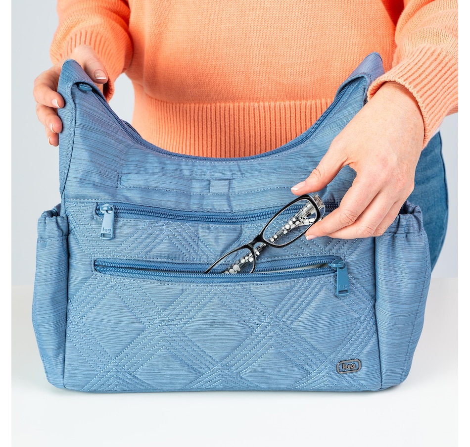 Image 755132_ALTMORE36.jpg, Product 755-132 / Price $59.99, Lug Collection Camper Crossbody Bag from Lug on TSC.ca's Home & Garden department