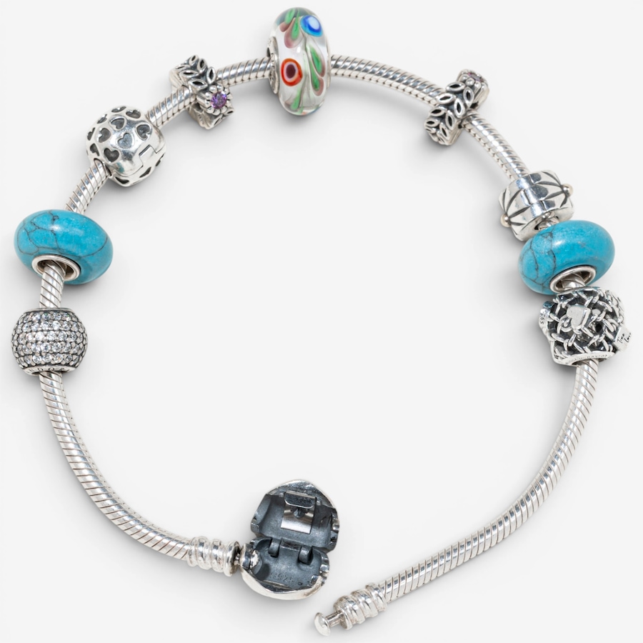 Image 755848_ALTMORE1.jpg, Product 755-848 / Price $450.00, Estate Originals Sterling Silver Pandora 9" Moments Bracelet with Charms from Estate Originals on TSC.ca's Jewellery department