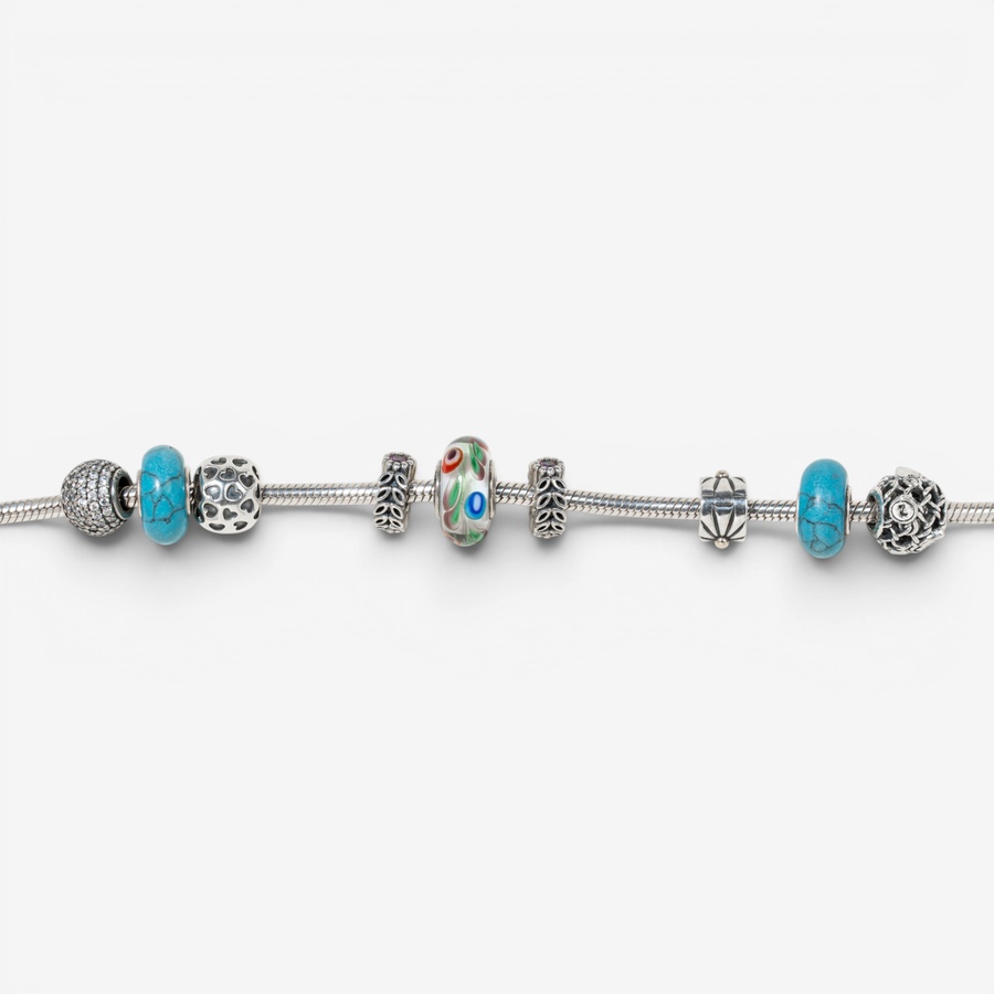 Image 755848_ALTMORE3.jpg, Product 755-848 / Price $450.00, Estate Originals Sterling Silver Pandora 9" Moments Bracelet with Charms from Estate Originals on TSC.ca's Jewellery department