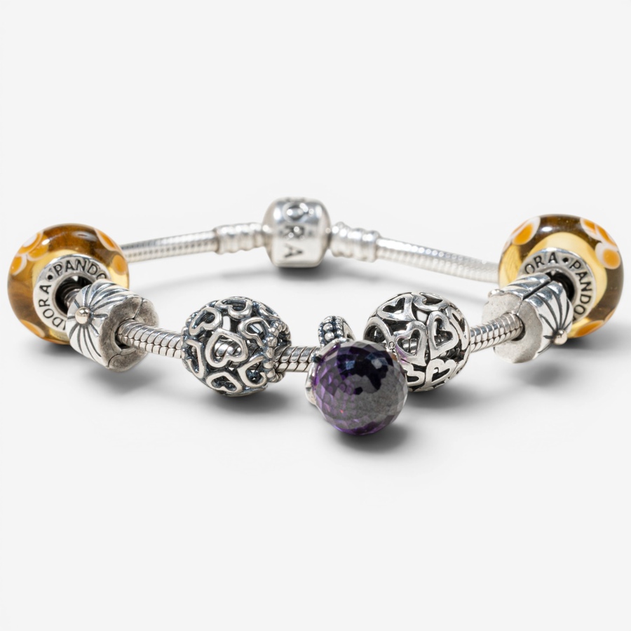 Image 755856_ALTMORE3.jpg, Product 755-856 / Price $450.00, Estate Originals Sterling Silver 7.5" Pandora Moments Bracelet with Charms from Estate Originals on TSC.ca's Jewellery department