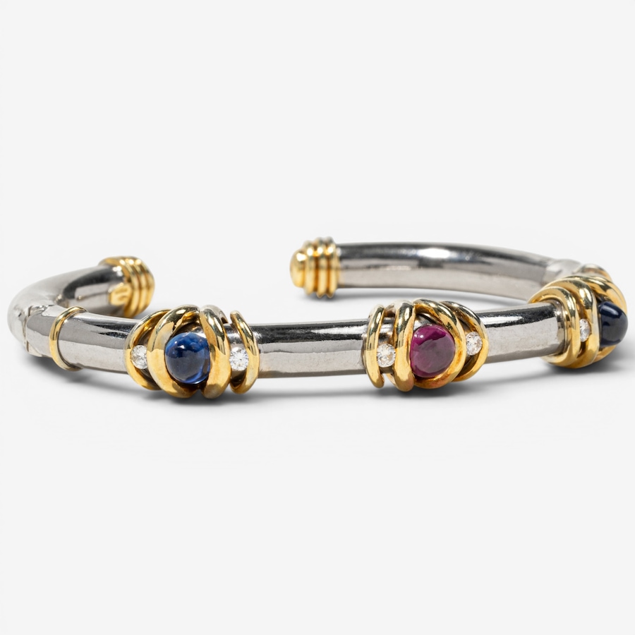 Image 755950_ALTMORE1.jpg, Product 755-950 / Price $10,995.00, Estate Originals 18K White and Yellow Gold Cabochon-Cut Ruby and Sapphire Open-Cuff Bracelet with Diamonds from Estate Originals on TSC.ca's Jewellery department