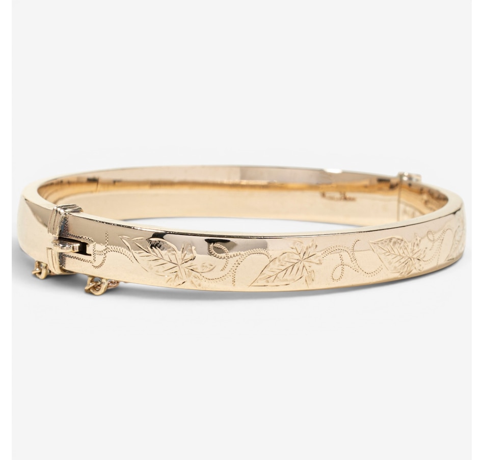Image 755978_ALTMORE1.jpg, Product 755-978 / Price $2,295.00, Estate Originals 9K Yellow Gold Engraved Oval Bangle Bracelet, Signed "Birks" from Estate Originals on TSC.ca's Jewellery department