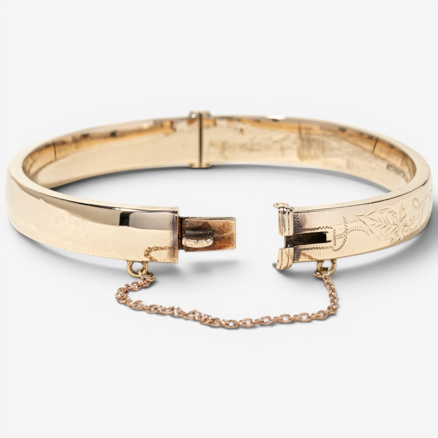 Image 755978_ALTMORE4.jpg, Product 755-978 / Price $2,295.00, Estate Originals 9K Yellow Gold Engraved Oval Bangle Bracelet, Signed "Birks" from Estate Originals on TSC.ca's Jewellery department
