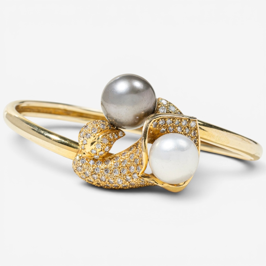 Image 756019.jpg, Product 756-019 / Price $7,595.00, Estate Originals 14K Yellow Gold Black and White South Sea Pearl and Diamond Calla Lily Motif Bangle Bracelet from Estate Originals on TSC.ca's Jewellery department