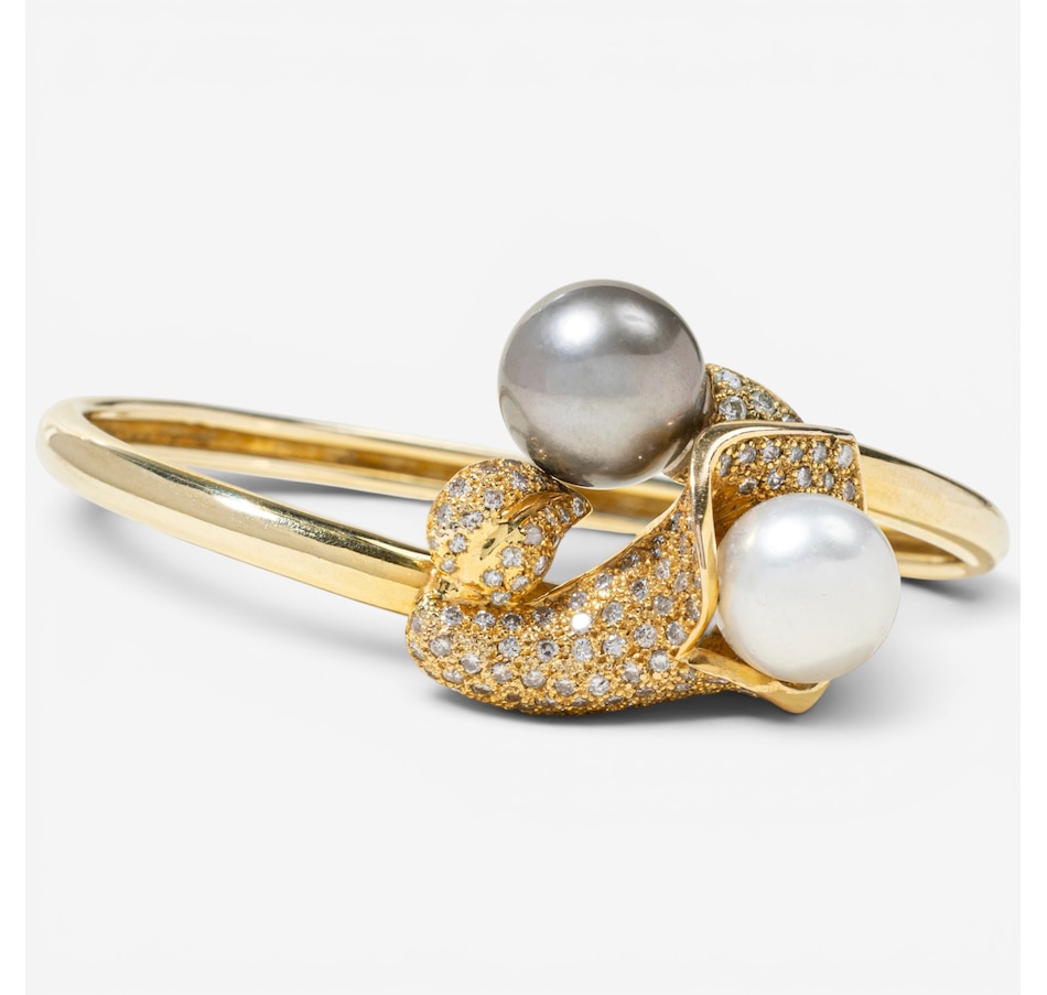 Image 756019_ALTMORE1.jpg, Product 756-019 / Price $7,188.00, Estate Originals 14K Yellow Gold Black and White South Sea Pearl and Diamond Calla Lily Motif Bangle Bracelet from Estate Originals on TSC.ca's Jewellery department