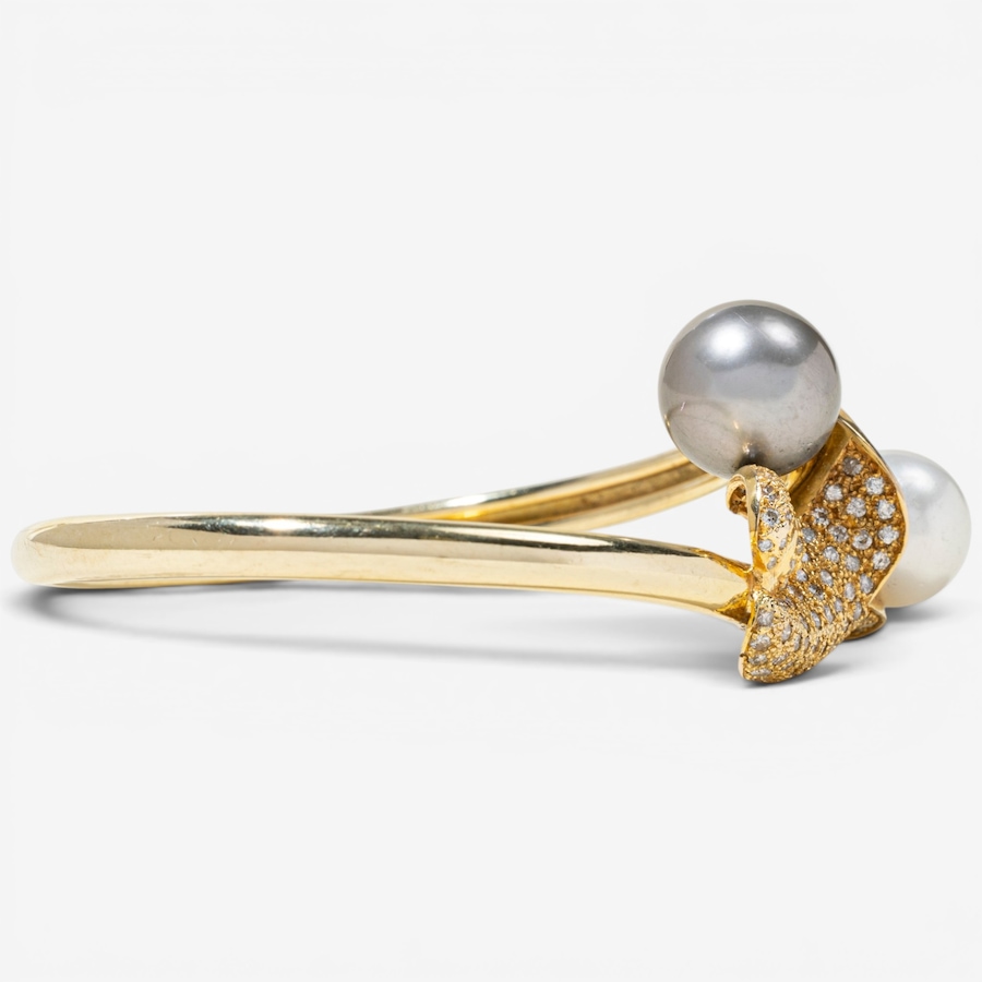 Image 756019_ALTMORE2.jpg, Product 756-019 / Price $7,595.00, Estate Originals 14K Yellow Gold Black and White South Sea Pearl and Diamond Calla Lily Motif Bangle Bracelet from Estate Originals on TSC.ca's Jewellery department