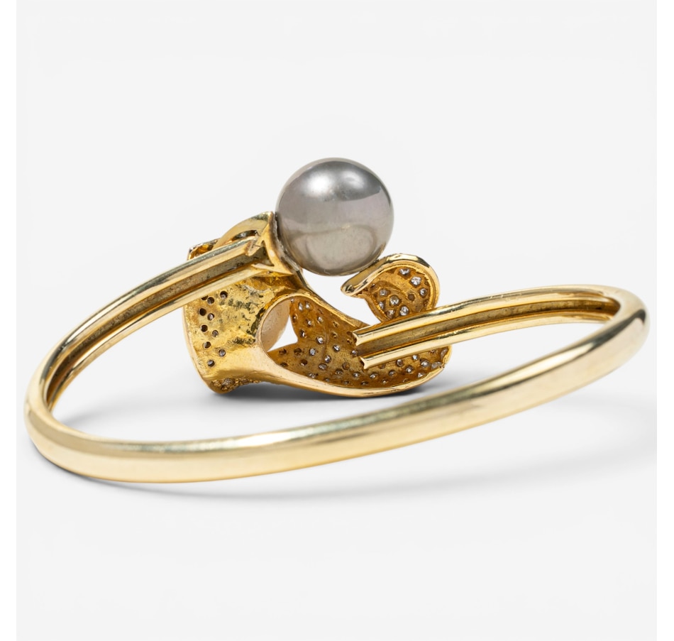 Image 756019_ALTMORE3.jpg, Product 756-019 / Price $7,188.00, Estate Originals 14K Yellow Gold Black and White South Sea Pearl and Diamond Calla Lily Motif Bangle Bracelet from Estate Originals on TSC.ca's Jewellery department