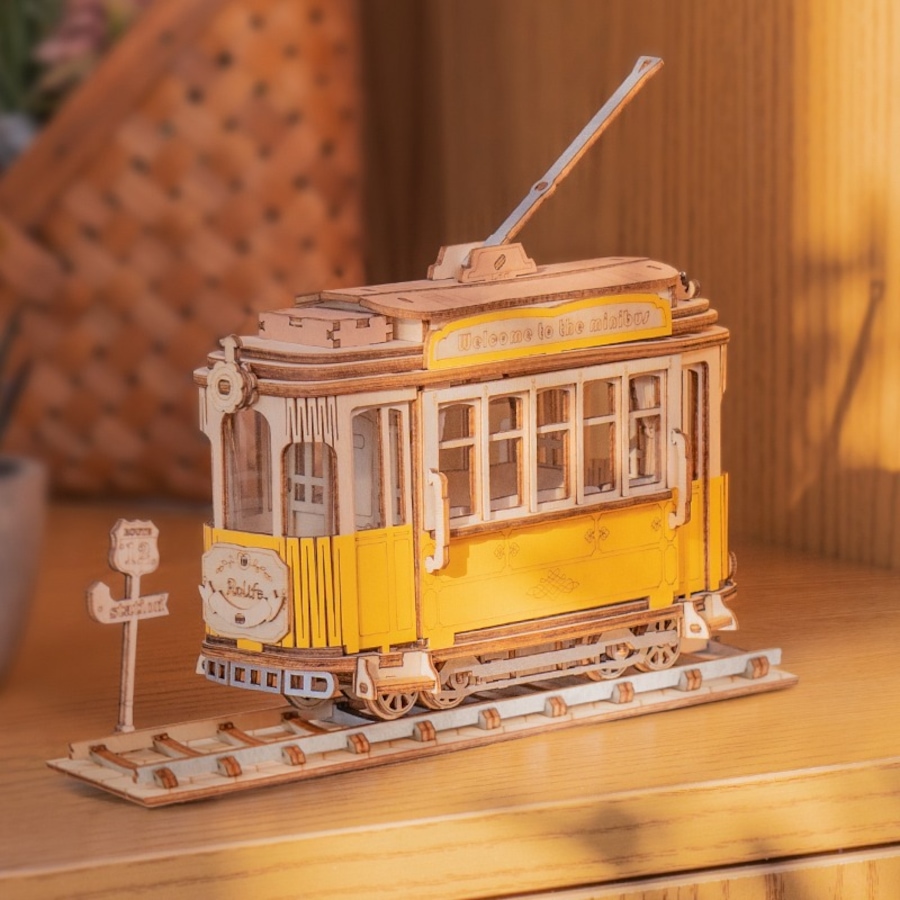 Image 800964_ALTMORE1.jpg, Product 800-964 / Price $19.95, Rolife Tramcar TG505 - 3D Wooden Puzzle Kit (145 Pieces) | STEM Educational Craft for Ages 8+ | Includes Precision-Cut Plywood | ~1.5-Hour Assembly | Assembled Size: 180x58x140mm | Fun and Detailed Tramcar Model | Ideal for Young Builders and Puzzle Enthus from Tradeopia on TSC.ca's Toys & Hobbies department