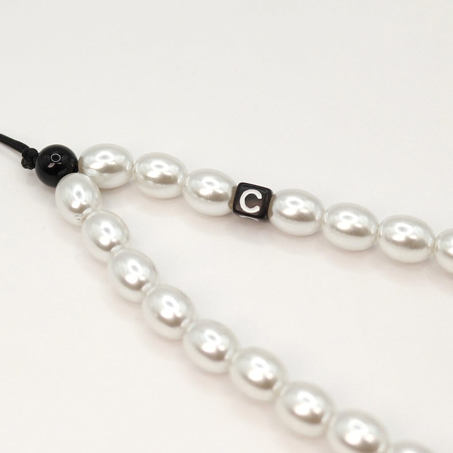 Image 899067_ALTMORE2.jpg, Product 899-067 / Price $19.99, Big White Pearl Phone Charm from Caseco on TSC.ca's Electronics department