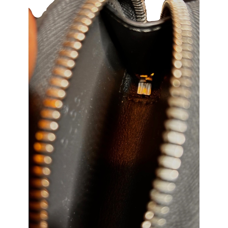 Image 929020_ALTMORE1.jpg, Product 929-020 / Price $716.00, Gucci Dark Gray Leather Earphone Case Zip Pouch Key Ring Clip from Gucci on TSC.ca's Fashion department