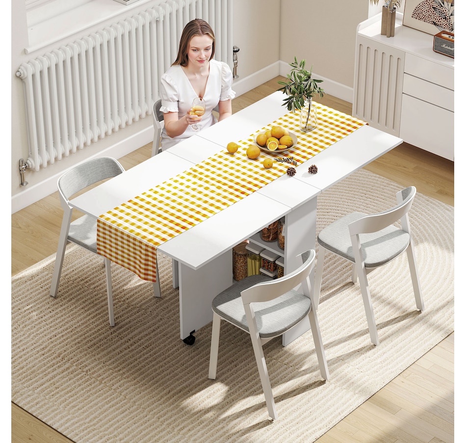 Image 929585_ALTMORE1.jpg, Product 929-585 / Price $129.99 - $144.99, HOMCOM Folding Dining Table, Drop Leaf Table with 2-tier Shelves from HOMCOM on TSC.ca's Home & Garden department