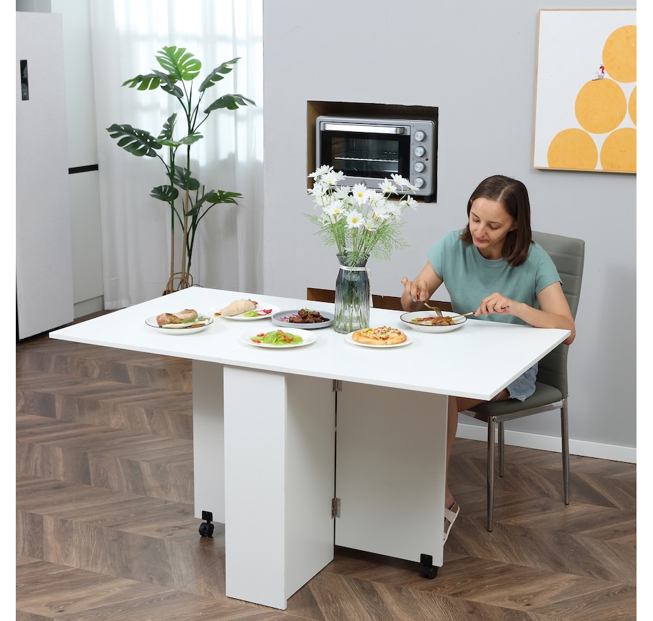 Image 929585_ALTMORE6.jpg, Product 929-585 / Price $129.99 - $144.99, HOMCOM Folding Dining Table, Drop Leaf Table with 2-tier Shelves from HOMCOM on TSC.ca's Home & Garden department
