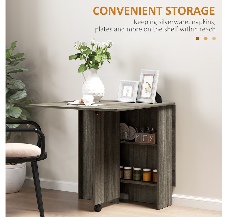 Image 929585_ALTMORE81.jpg, Product 929-585 / Price $129.99 - $144.99, HOMCOM Folding Dining Table, Drop Leaf Table with 2-tier Shelves from HOMCOM on TSC.ca's Home & Garden department