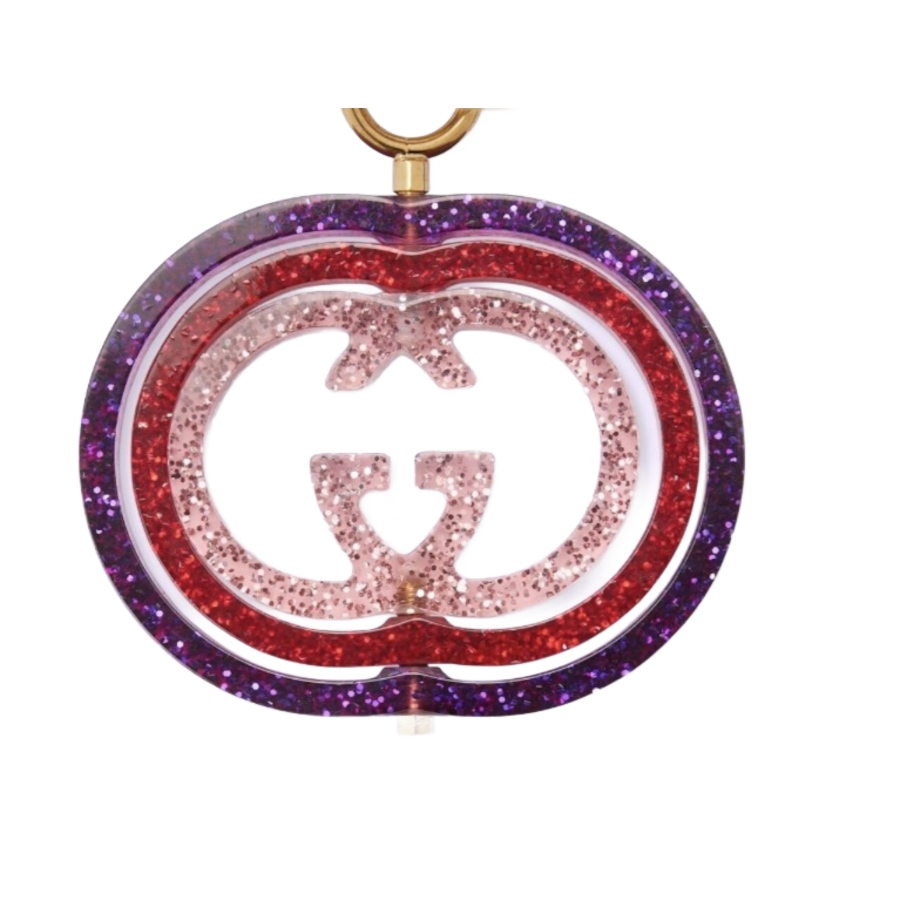 Image 936990_ALTMORE1.png, Product 936-990 / Price $716.00, Gucci Interlocking G Purple and Red Glitter Keychain Handbag Charm from Gucci on TSC.ca's Fashion department