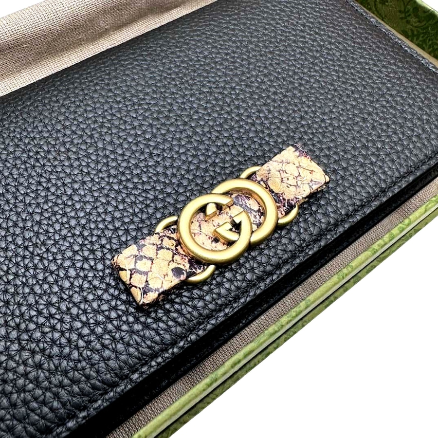 Image 936996_ALTMORE18.jpg, Product 936-996 / Price $2,306.00, Gucci Interlocking GG Black Python Leather Bow Wallet on Chain Gold Hardware from Gucci on TSC.ca's Fashion department