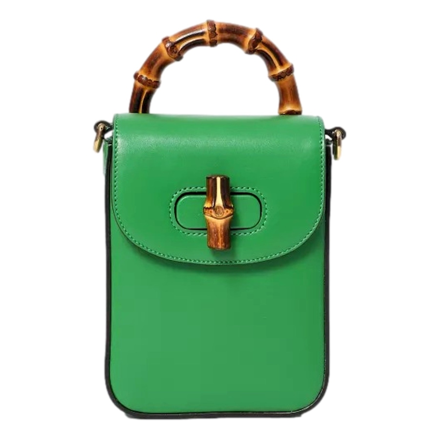 Image 948569_ST01.jpg, Product 948-569 / Price $2,536.00, Gucci Bamboo 1947 Mini Green Leather Top Handle Crossbody Bag from Gucci on TSC.ca's Fashion department