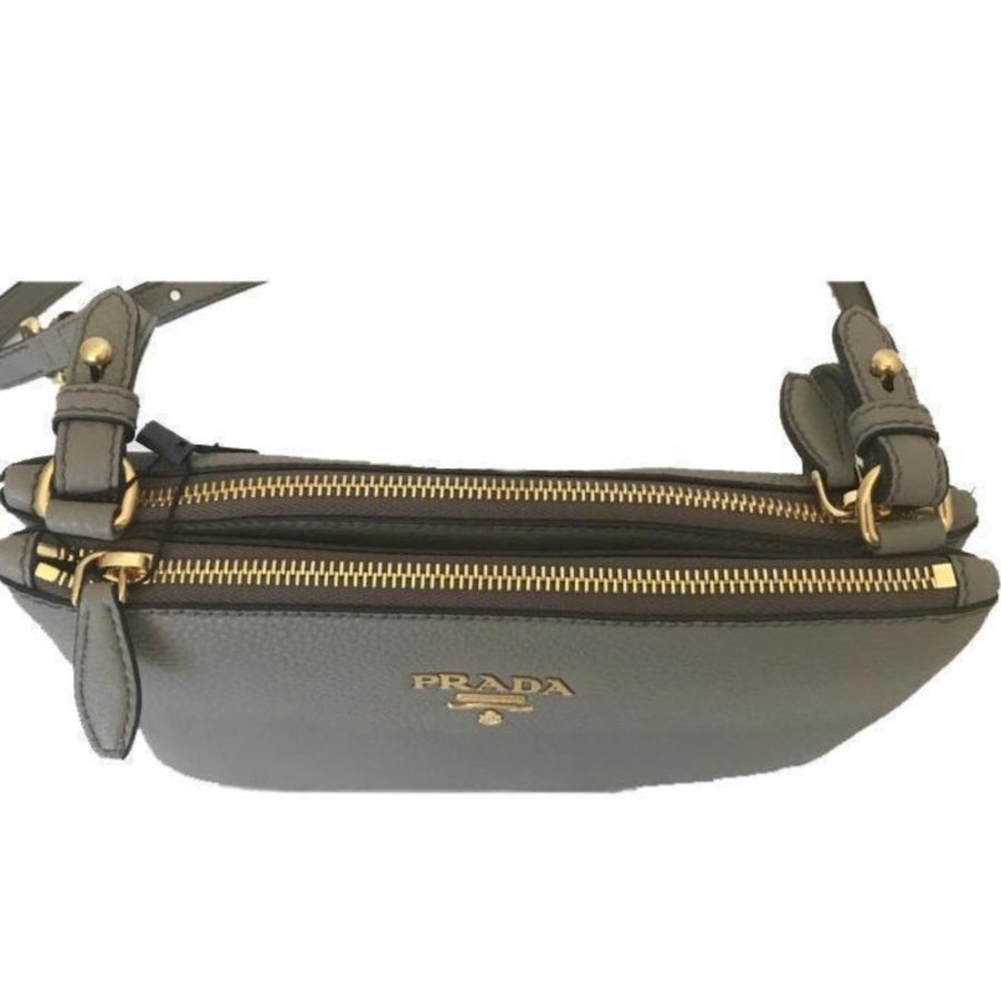 Image 953450_ALTMORE9.jpg, Product 953-450 / Price $4,126.00, Prada Vitello Phenix Argilla Gray Leather Logo Plaque Crossbody Bag from Prada on TSC.ca's Fashion department