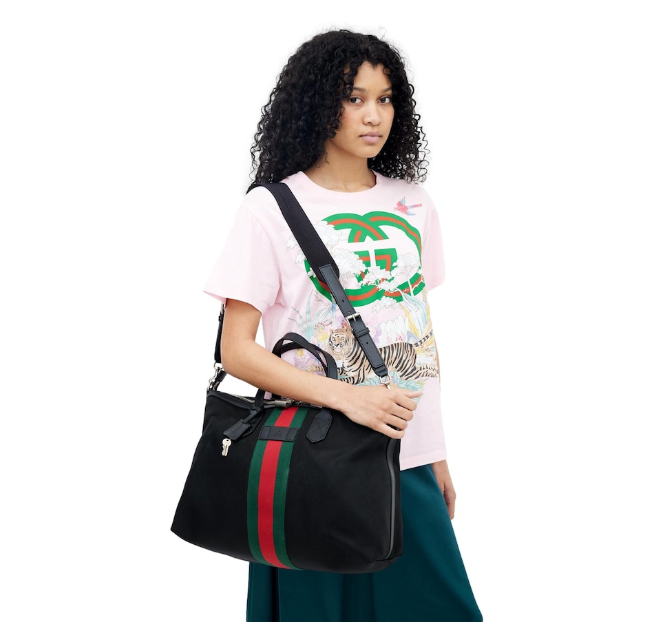 Image 953720_ALTMORE1.jpg, Product 953-720 / Price $3,498.00, Gucci Techno Web Stripe Black Canvas Large Duffle Bag Crossbody Travel Bag from Gucci on TSC.ca's Fashion department