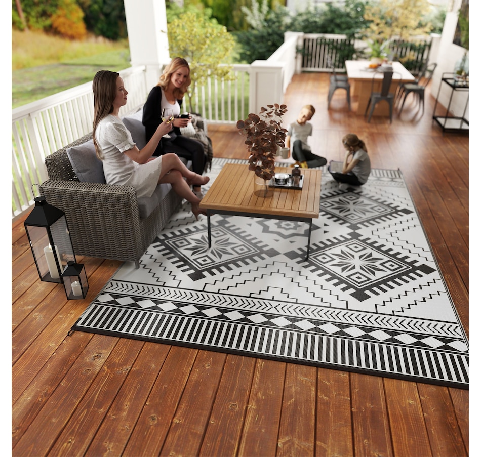 Image 964485_ALTMORE8.jpg, Product 964-485 / Price $89.99, Outsunny 9' x 12' Reversible Outdoor Rug, Toothed Rhombus, White, Black from Outsunny on TSC.ca's Home & Garden department